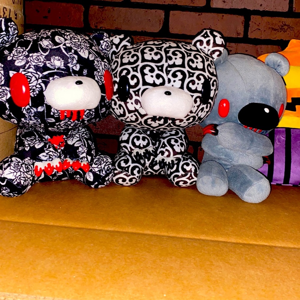 12 inchinch tall gray and red and black and a 44 cm on both gloomy bears withtag